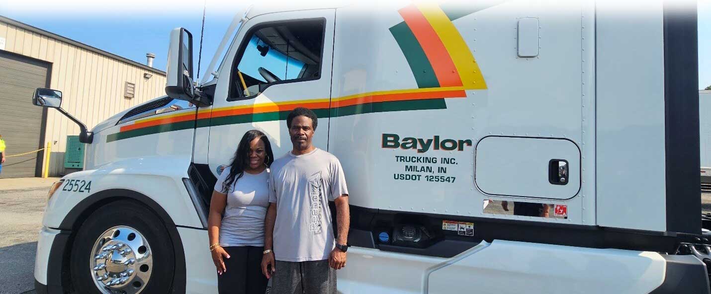 drivers in front of truck